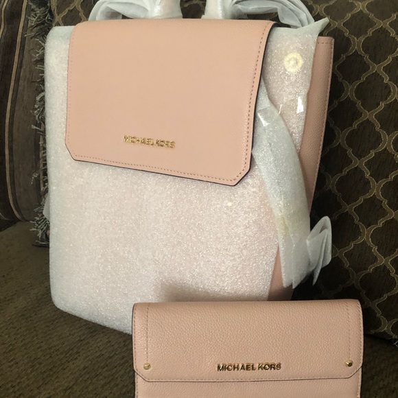 Michael Kors Handbags - Michael Kors Hayes Backpack and Wallet set